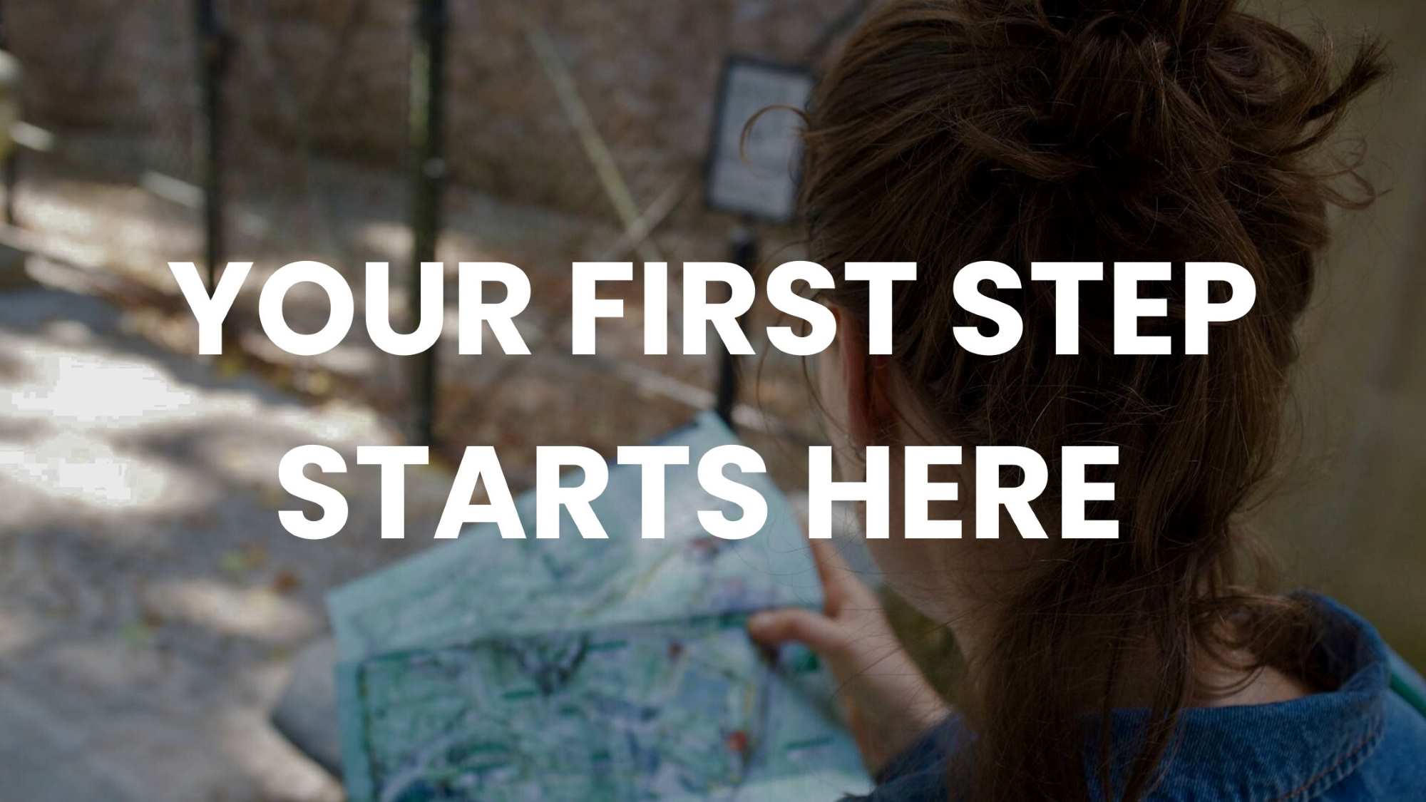 "Roadmap to dream home depicted by woman with map on path, 'YOUR FIRST STEP STARTS HERE'."