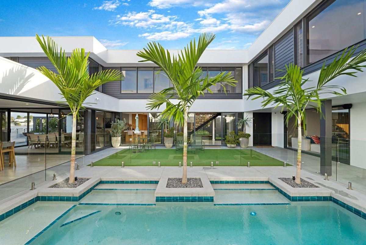 Day view of courtyard, pool, and home at 28 Kookaburra Court, Sorrento.