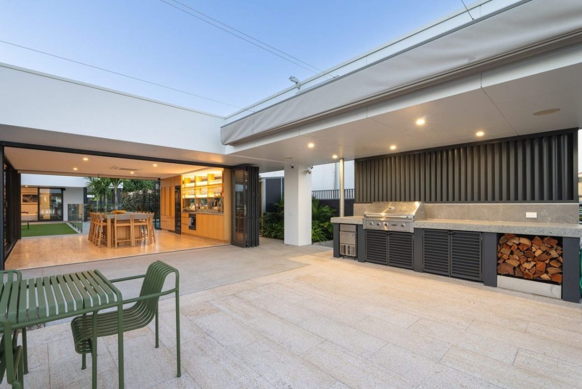 Rear terrace view at 28 Kookaburra Court, Sorrento, showing the entertainment room, undercover BBQ area, and retractable roof