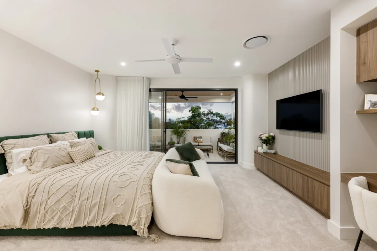 Luxurious master bedroom with private terrace, convex media wall, and study nook